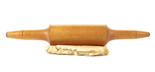 Dough and rolling pin on a white background.
