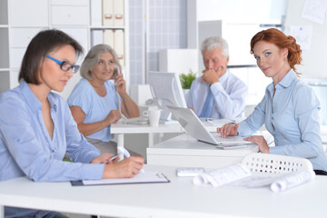 business people working at desk in office