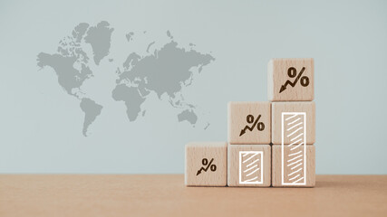 Wooden blocks with percentage sign and down arrow, financial recession crisis, interest rate...