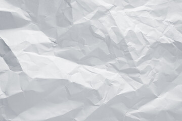 White crumpled paper texture background, clean white wrinkled paper, top view.