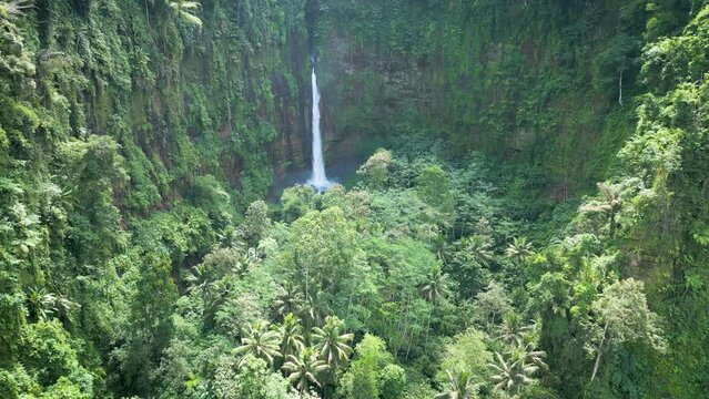 Aerial view of Coban Kapas Biru waterfall. East Java, Indonesia