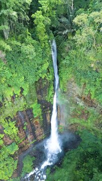 Aerial view of Coban Kapas Biru waterfall. East Java, Indonesia