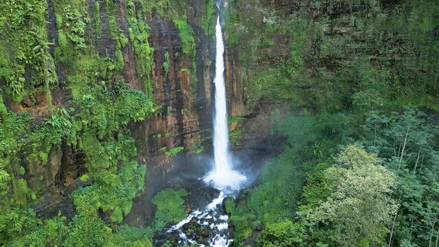 Aerial view of Coban Kapas Biru waterfall. East Java, Indonesia