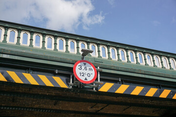 low bridge with height restriction of 3.6m on road underpass.  