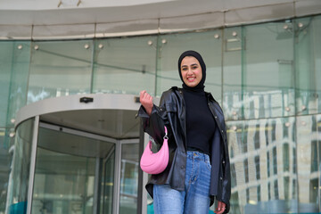 Young muslim woman with hijab posing