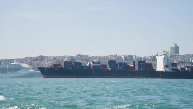 Istanbul, Turkey, June 10, 2023. View of a cargo ship on the Bosphorus Strait.