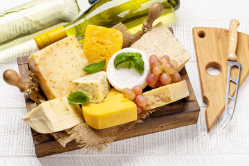 Various cheese and white wine