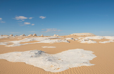 Barren desert landscape in hot climate with rock formation