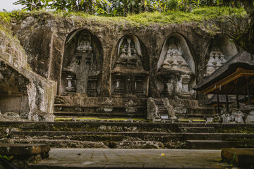 Naklejka premium Historical Pura Gunung Kawi temple. Bali ancient architecture, kawi mountain with royal tombs