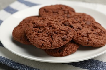Delicious chocolate chip cookies on plate, closeup