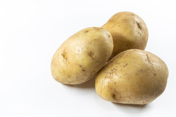 Image of potatoes on isolated white background showing various skin texture