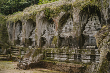 Fototapeta na wymiar Pura Gunung Kawi royal tombs. Ancient bali temple attraction, historical rocky temple in ubud
