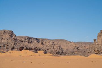 view in the Sahara desert of Tadrart rouge tassili najer in Djanet City  ,Algeria.colorful orange sand, rocky mountains