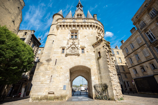 The door or gate Porte Cailhau is beautiful gothic architecture from the 15th century. It is both a defensive gate and triumphal arch. Bordeaux, France. High quality photography.