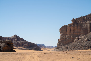 view in the Sahara desert of Tadrart rouge tassili najer in Djanet City  ,Algeria.colorful orange sand, rocky mountains