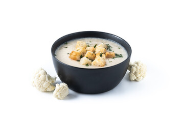 Cauliflower soup in a bowl isolated on white background.