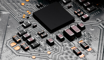 Close up of components and microchips on PC circuit board.