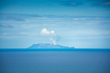 Whakaari/White Island is an active marine volcano that is located 49 kilometres offshore from Whakatane. View from Kohi Point Lookout, Whakatane, New Zealand © Irina B