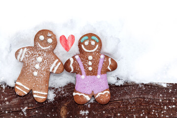 Homemade gingerbread man. Couple and heart. Concept of love, Valentine's Day.