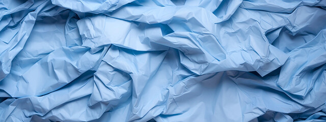 Blue crumpled paper background. Texture of crumpled paper. 