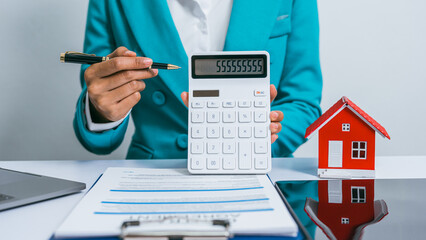Realtor with contract, red house model, amenities, appraisal price, built-in, central business...
