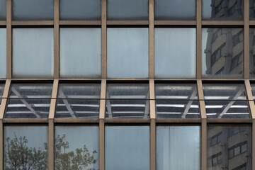 A glass façade that reflects itself.