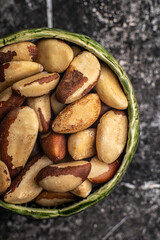 Tasty brasil nuts on black background