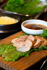 Fresh and delicious iron pan-fried black pork meal in Jeju Korean restaurant.