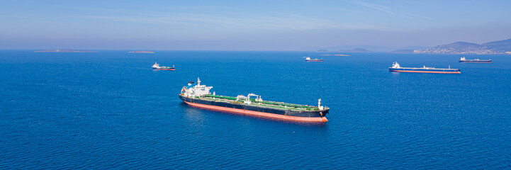 Logistic of crude oil for export or import by crude oil tankers vessels, aerial wide shot