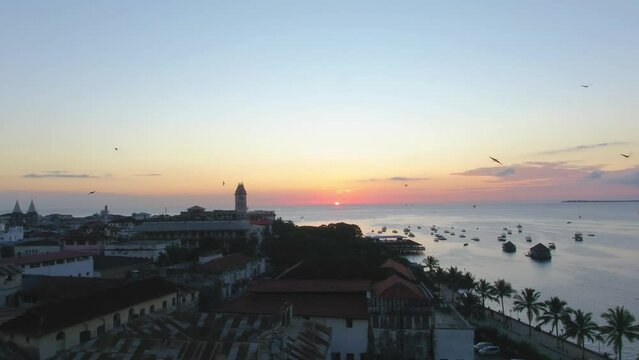 Drone stock footage of Zanzibar Island, sunset over the shoreline