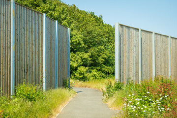 Fototapeta na wymiar wooden boarded fence background in english town uk
