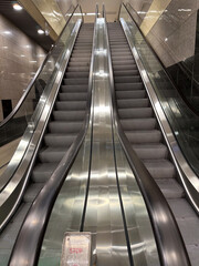 escalators. escalators photographed inside. detail.