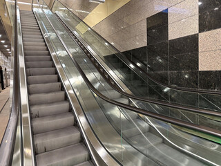 escalators. escalators photographed inside. detail.