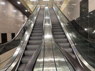 escalators. escalators photographed inside. detail.