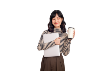 Beautiful smiling young asian businesswoman carrying laptop computer and cup of coffee to go while standing isolated over white background - PNG format
