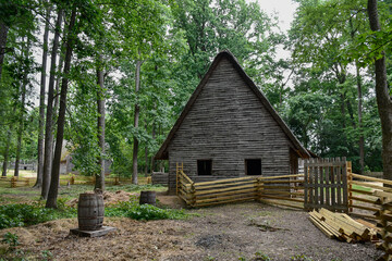 A frame house with wooden fence, country, Henricus Historical Park, Chester, Virginia