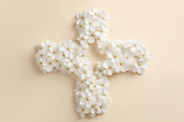 Culture and religion concept. Top view of christian cross made of white flowers blossoms and placed on bright background with copy space. Generative AI