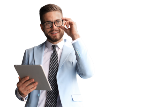 Modern business man in formalwear using digital tablet while standing on a transparent background