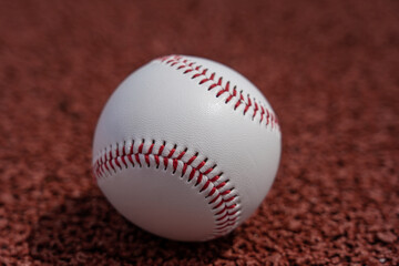 Baseball ball lies on the ground