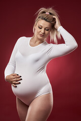 Pregnant woman in white