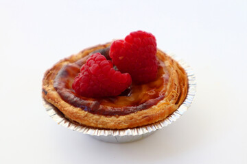 Tasty traditional dessert Pastel de nata on white background