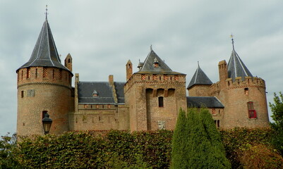 Fototapeta na wymiar Netherlands, Muiden Castle, Historic gardens, view of the walls and towers of the fortress