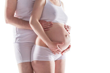 Couple expecting a baby and touching pregnant woman's belly. Isolated on transparent white...