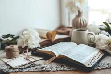Open bible in home morning interior