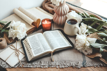Open bible in home morning interior