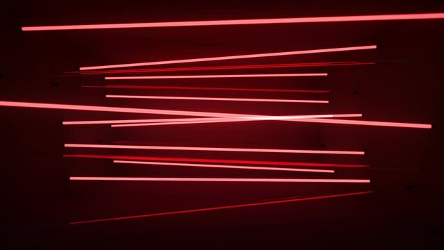 Horizontal Neon Tubes, light stripes, glowing and pulsating in red colors - Seamless VJ Loop