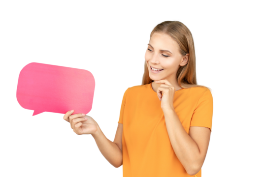 Happy beautiful young blonde woman standing isolated on a transparent background, holding empty speech bubble