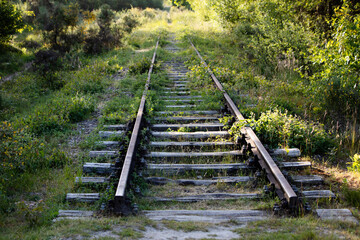 Dead end abandoned railroad track with selective focus