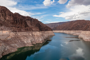Scenic view of Colorado River seen from Hoover Dam near Mike O'Callaghan Pat Tillman Memorial Bridge, Nevada Arizona, USA. Blue turquoise water from Lake Mead surrounded by River mountain range