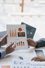 Business documents, Business people consulting meeting to discuss financial report analysis and...